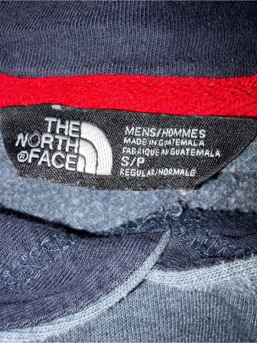 The North Face Men’s Gray Pullover Hoodie with Red Drawstrings